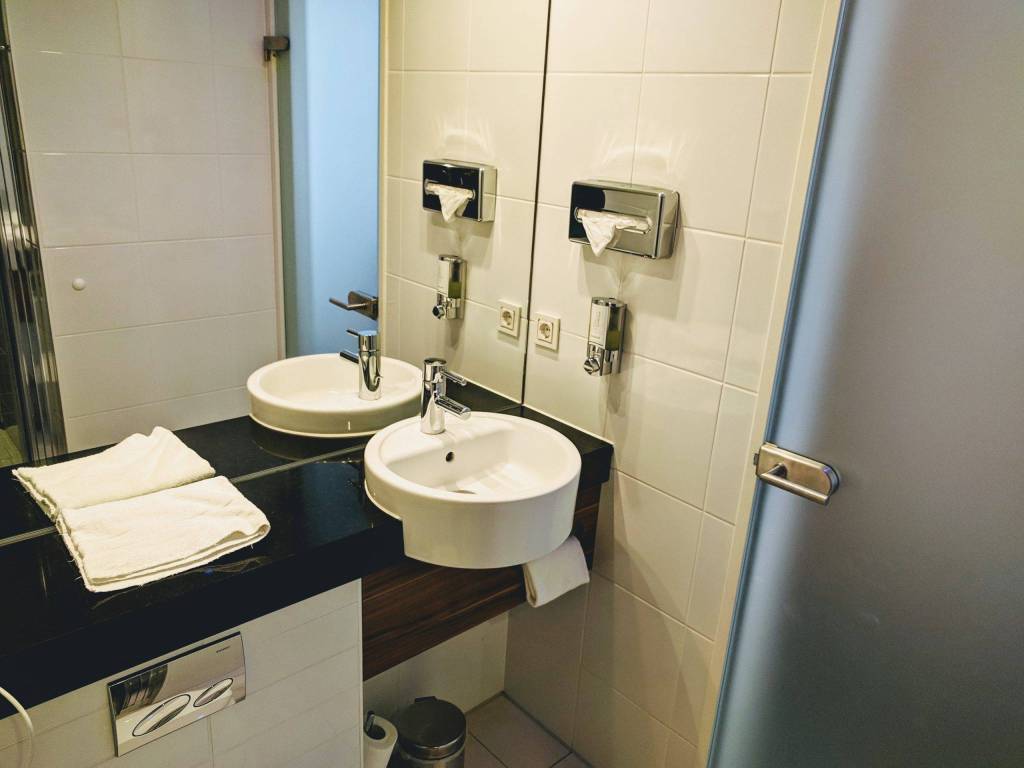 European vs American Hotels: tiny european bathroom