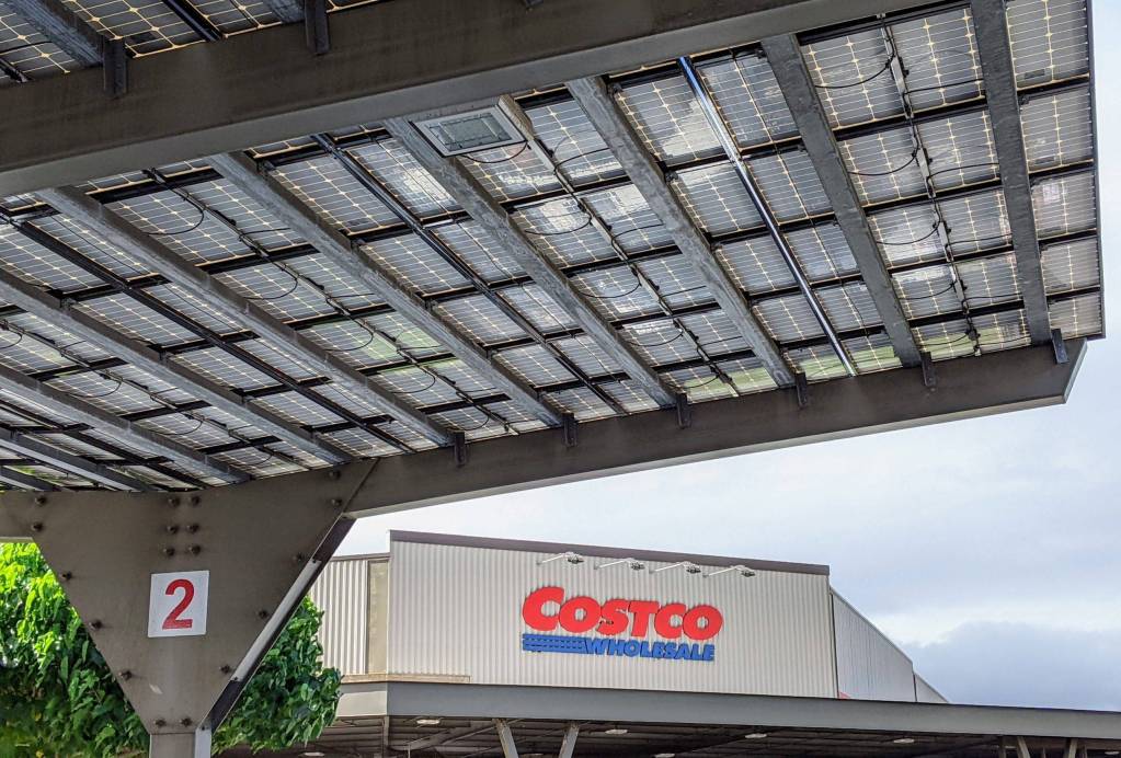 Costco on Maui with an endless solar panels as parking lot roofs