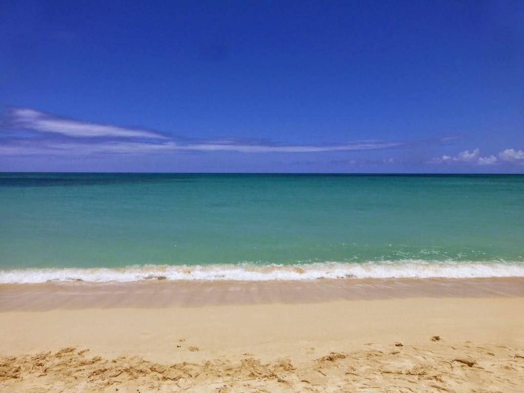 Oahu Hawaii: Waimanalo Beach Park. Calm, pristine waters, white fine sand, and campsites!