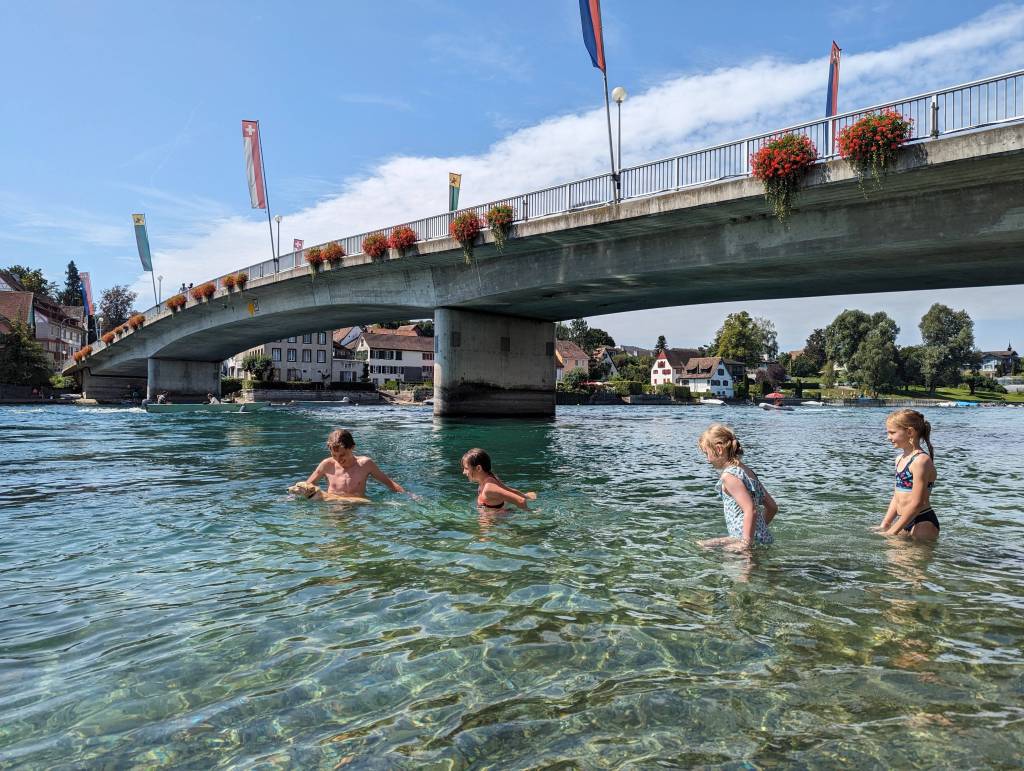 Switzerland with kids in summer: swimming in the Rhein river