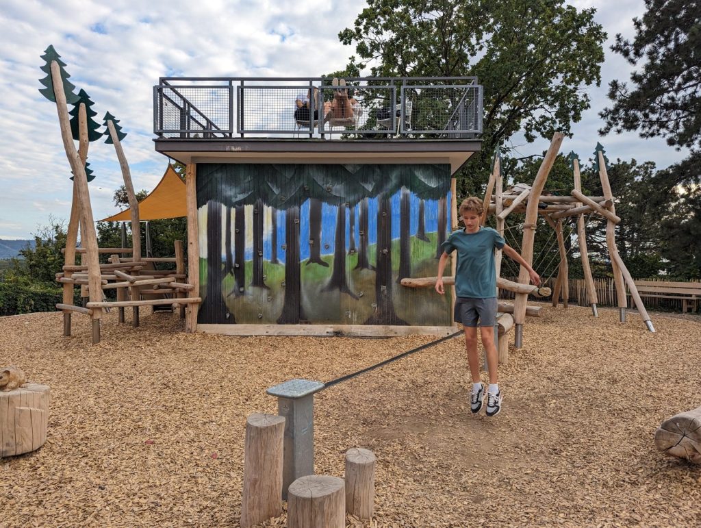 Artem at one of the playgrounds at the Zoo, this one has panoramic views over the city