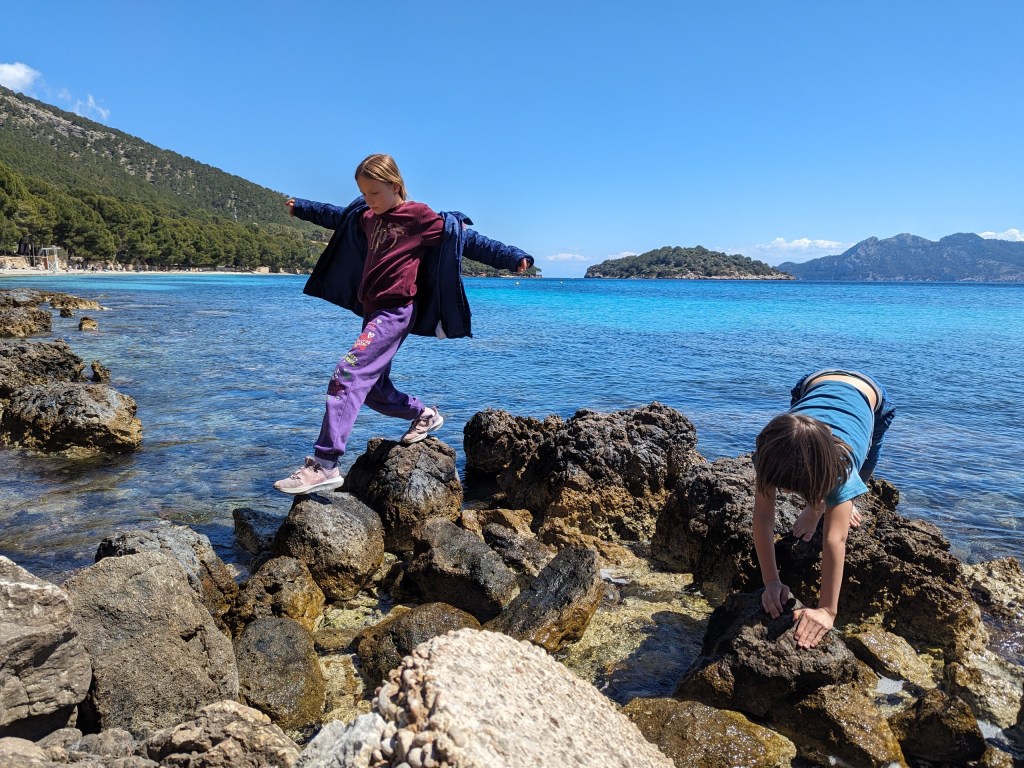 Erika and Andrew playing at the Formentor beach
